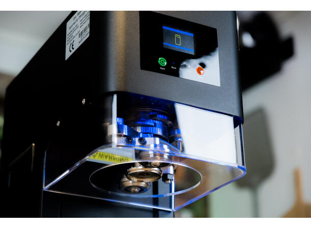 Automatisk burkmaskin