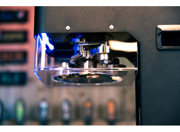 Automatisk burkmaskin